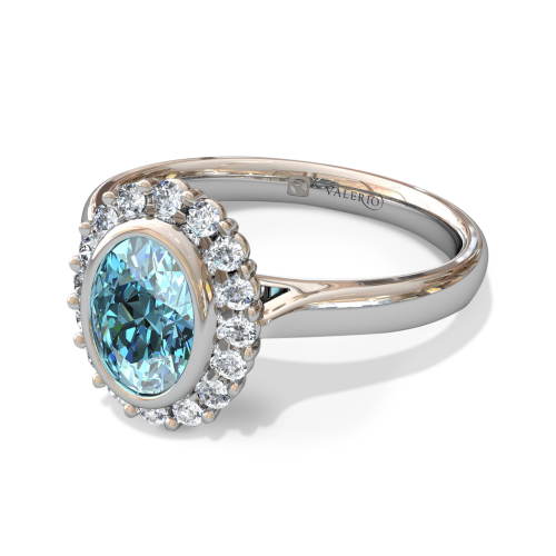 Oval Aquamarine and Diamond Cluster Engagement Ring