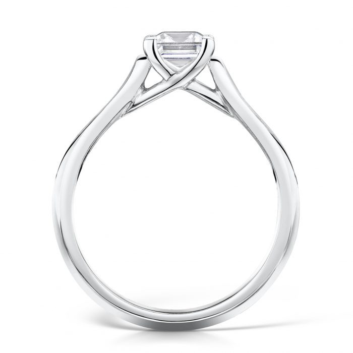 Solitaire Diamond Ring. Princess Cut Centre stone with diamonds on sides